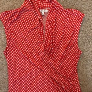 Lovely orange and white printed blouse